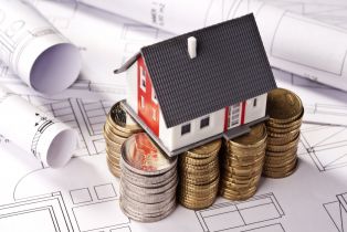 Jak bezpiecznie inwestować w nieruchomości? Wskazówki prawnika